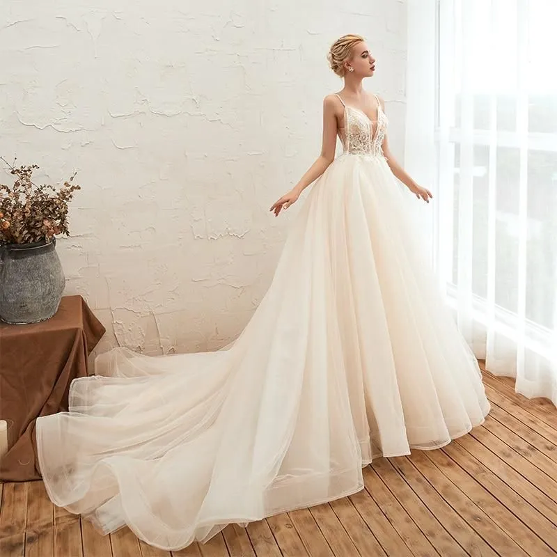Romantic Spaghetti Straps Wedding Dress with Chapel Train